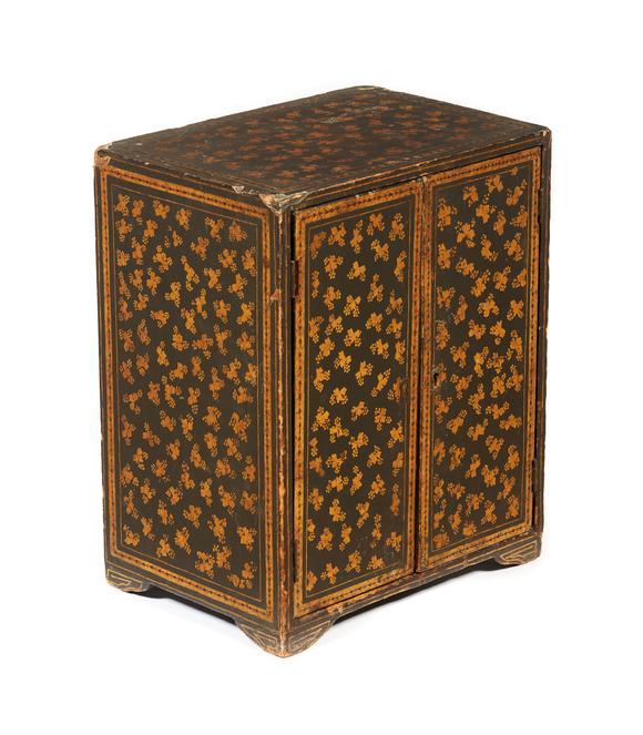 VERITAS Art AuctioneersA Japanese black lacquered miniature cabinet