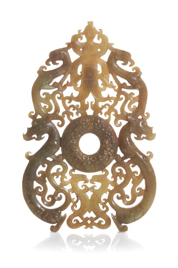 VERITAS Art AuctioneersA Chinese carved jade plaque / pendant