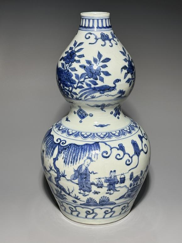 SEAVIEW AUCTIONS PTY LTDA Blue and White Double-Gourd Vase with Sages, Peacock and Floral Landscape Panels, China, 14th–17th century