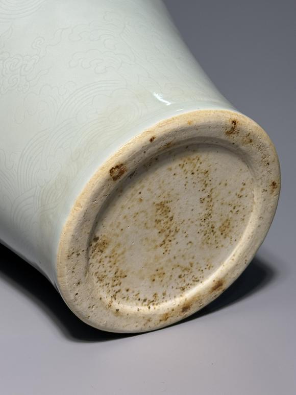 SEAVIEW AUCTIONS PTY LTDA White Porcelain Meiping Vase with Incised Dragon and Cloud Patterns, China, 18th century