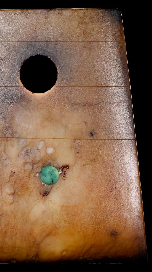 Castle AuctionA Calcified Brown Jade Axe Pendant with Turquoise Inlay, Neolithic, Circa 3300–2300 C BC Pr.