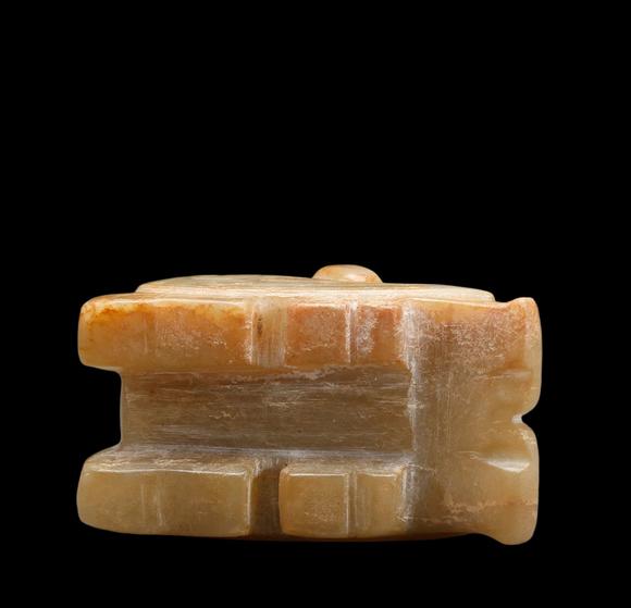 Castle AuctionA Pale Calcified Jade Recumbent Bird Carving, Late Shang, Circa 12th–11th C BC Pr.