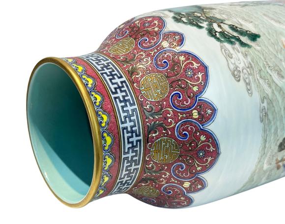 Castle AuctionA Chinese Rouge Famille Rose vase adorned with the Eight Immortals' figures pattern, together with A Chinese porcelain stand, Qian Long Pr. 
