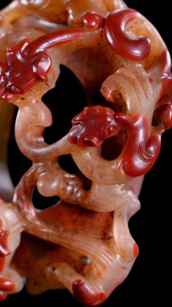 Castle AuctionA Red and Pale Jade Chilong Dragon Carving, Han, Circa 2nd C BC–2nd C AD Pr.
