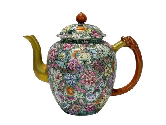Castle AuctionThe famille rose and flowers décor teapot, Qian Long Pr. 