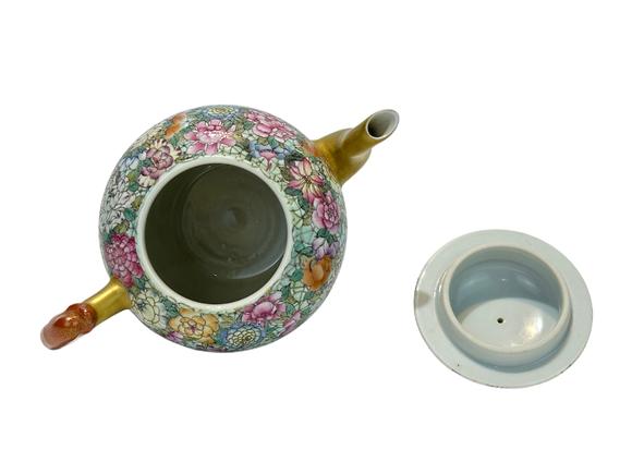 Castle AuctionThe famille rose and flowers décor teapot, Qian Long Pr. 