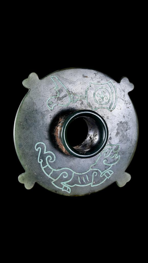 Castle AuctionA Dark Green Jade Stem Cup Stand with Turquoise Inlay, Warring States, Circa 475–221 C BC Pr.