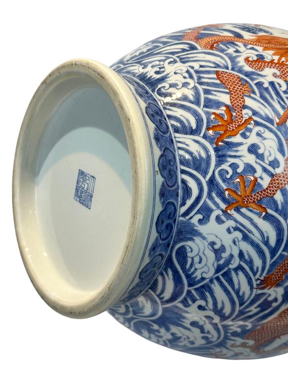 Castle AuctionAn extra large size of vase with double ears, and  cloud dragon patterns, Qian Long Pr. 
