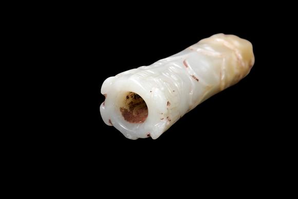 Castle AuctionA Pale Celadon Jade Taotie Tube Bead, Western Zhou, Circa 10th–9th C BC Pr.