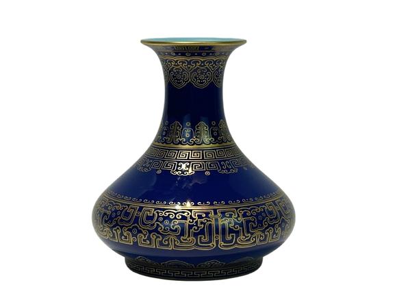 Castle AuctionA Chinese blue ground vase with gilt dragon pattern, Qian Long Pr. 