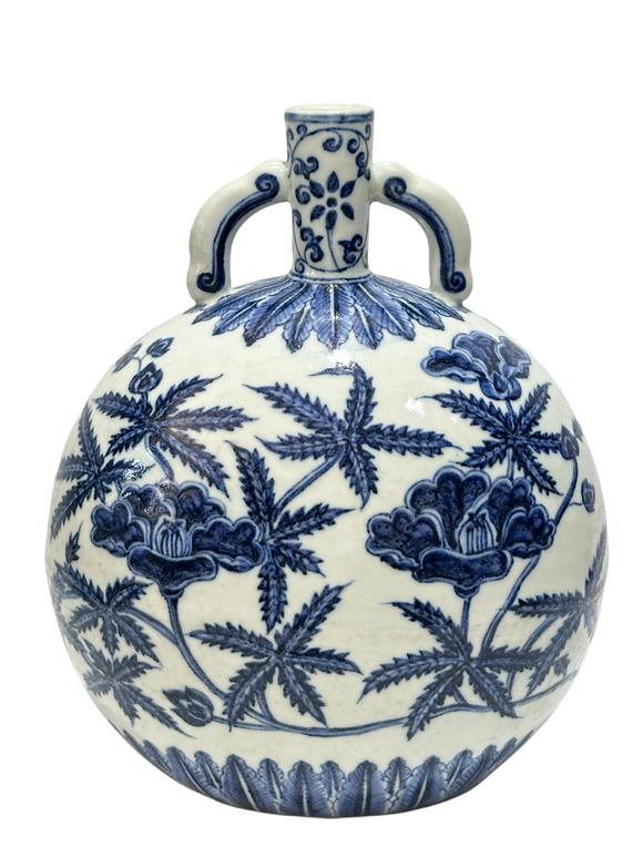 Castle AuctionA Chinese Blue and white okrA Chinese pattern moonflask vase, Ming Dynasty Pr. 