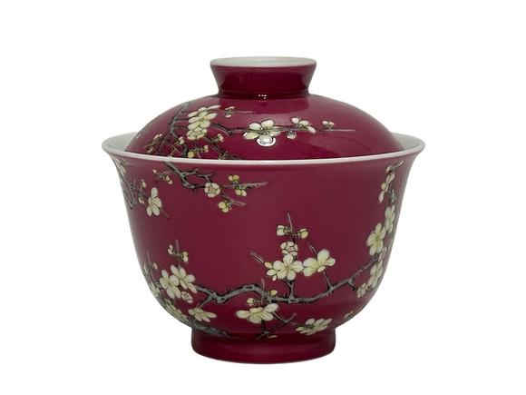 Castle AuctionA rouge-red ground bowl decorated with plum blossom pattern, and with cover, Qing Dynasty Pr. 