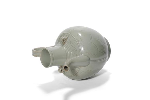 Castle AuctionA Longquan Celadon Carved Floral Ewer, 13th–14th C Pr.