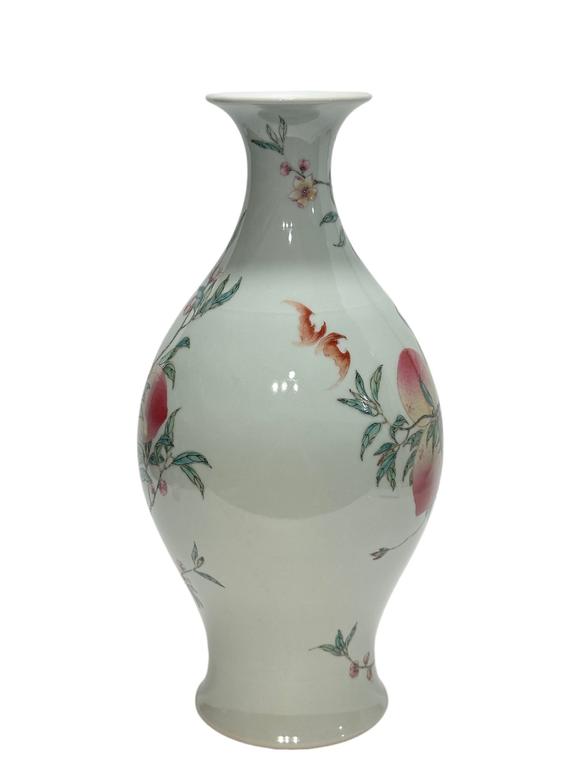 Castle AuctionAn oliva shape famille rose vase, YongZheng Pr. 