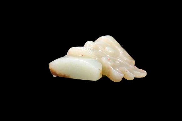 Castle AuctionA Pale Celadon Jade Taotie Mask Pendant, Shang, Circa 13th–11th C BC Pr.