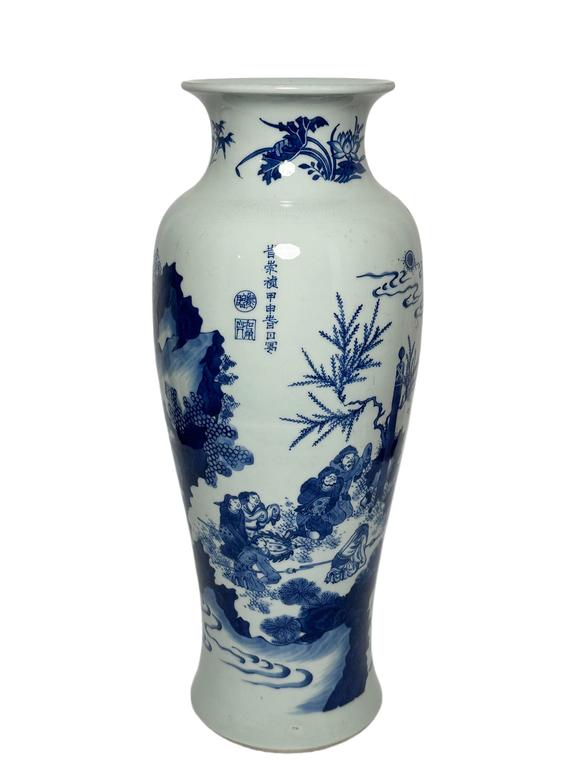 Castle AuctionA Chinese blue and white figure tube vase, Kang Xi Pr. 