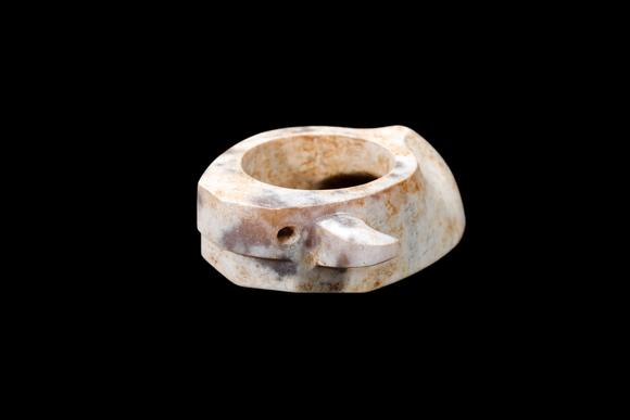 Castle AuctionA Calcified Pale Jade Archer's Ring, Warring States, Circa 475–221 BC Pr.
