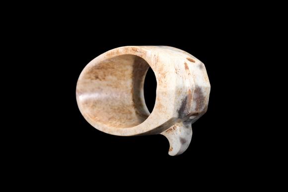Castle AuctionA Calcified Pale Jade Archer's Ring, Warring States, Circa 475–221 BC Pr.