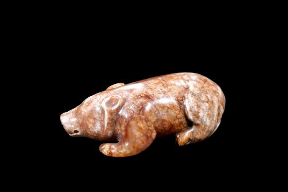 Castle AuctionA Mottled Russet Jade Bear Carving, Han, Circa 2nd C BC–2nd C AD Pr.