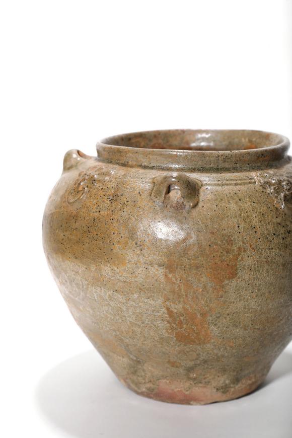 Castle AuctionA Pair of Yue Kiln Multi-Lug Jars, 3rd–6th C Pr.