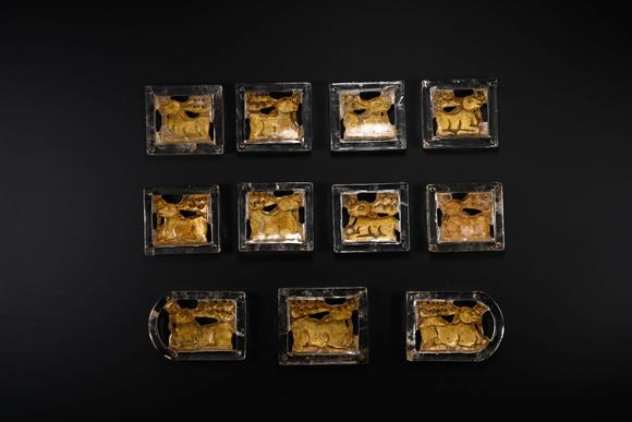 Cascade'sEleven-piece set with square pattern of Han and Rui animals. | 漢 鏨瑞獸紋方形帶銙十一件成套