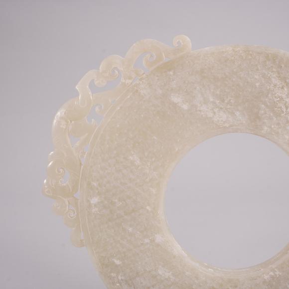 Eden Fine Antiques Galleries LLCA CHINESE WHITE JADE BI WITH DRAGON OPENWORK