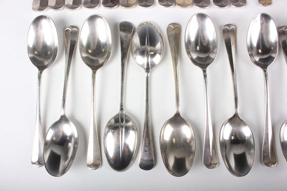 TooveysA George VI part canteen of silver Hanoverian with Rat Tail pattern cutlery, comprising twelve table forks, eight dessert forks, twelve dessert spoons