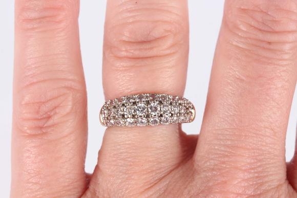 TooveysA 9ct gold ring, claw set with three oval cut green diopsides between baguette cut diamond set shoulders, ring size approx M, and a 9ct gold and colou