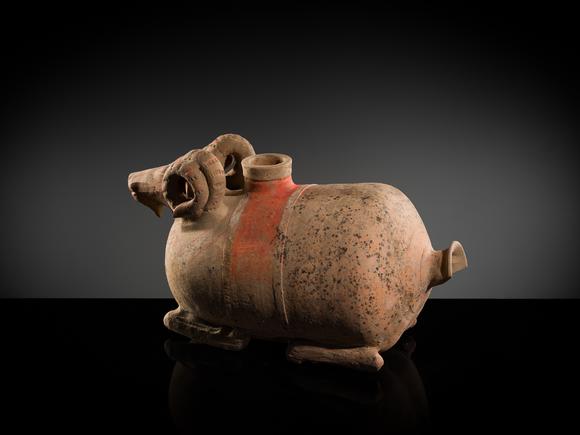 Galerie ZackeA LARGE PAINTED POTTERY ‘RAM’ VESSEL, ZUN, HAN DYNASTY