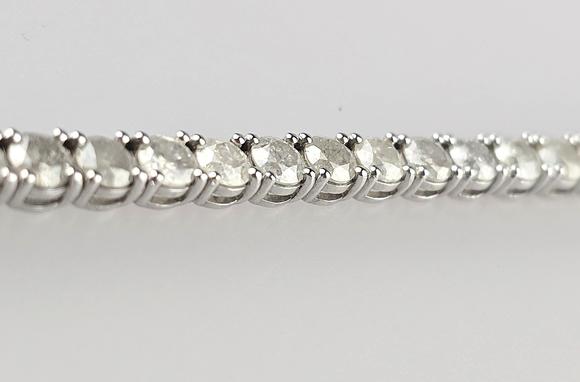 Auktionshaus BlankFeines 14K-Tennisarmband - Wei?gold 585/000 (14 K.), ausgefasst mit