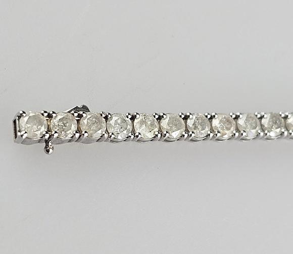 Auktionshaus BlankFeines 14K-Tennisarmband - Wei?gold 585/000 (14 K.), ausgefasst mit
