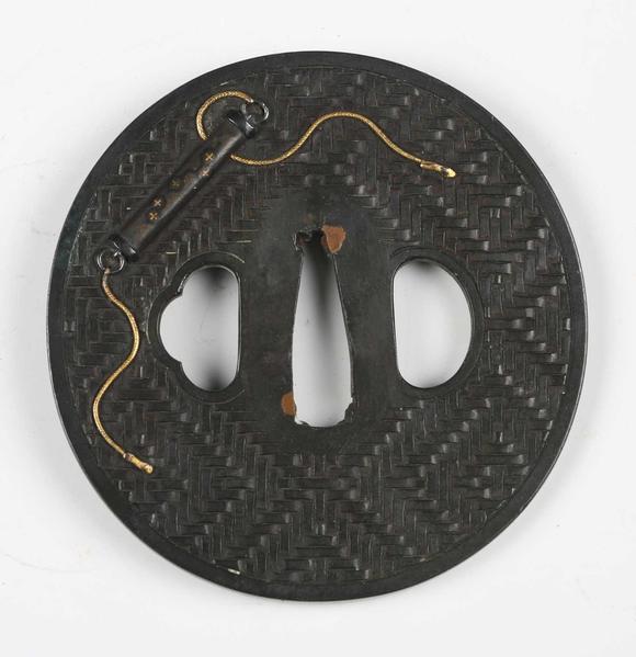 TooveysA very fine Japanese oval shakudo-inlaid bronze tsuba, Edo p