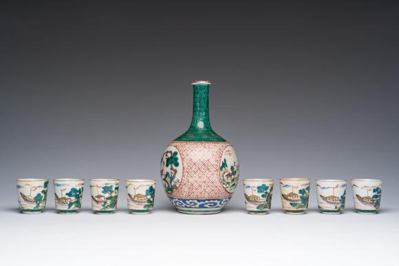 Coronari Auctions BVA Japanese Kutani 'tokuri' or sake bottle and eight cups with landscape design, Meiji, 19th C.
