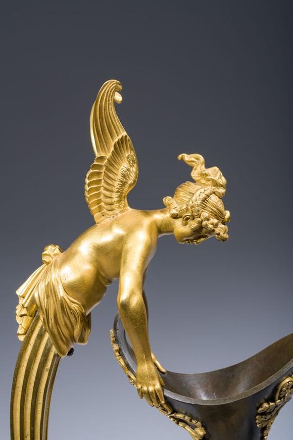Coronari Auctions BVAn impressive pair of French Empire gilt and patinated bronze ewers on marble bases, attributed to Claude Galle, ca. 1800-1810