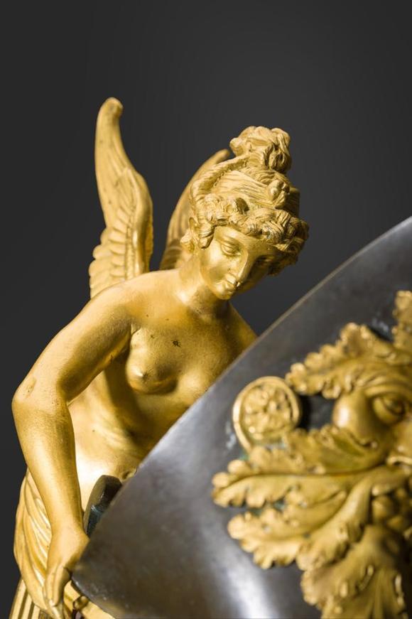 Coronari Auctions BVAn impressive pair of French Empire gilt and patinated bronze ewers on marble bases, attributed to Claude Galle, ca. 1800-1810
