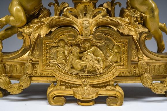 Coronari Auctions BVA fine and exceptional French Napoleon III gilt bronze three-piece clock garniture with putti and floral design, 19th C.