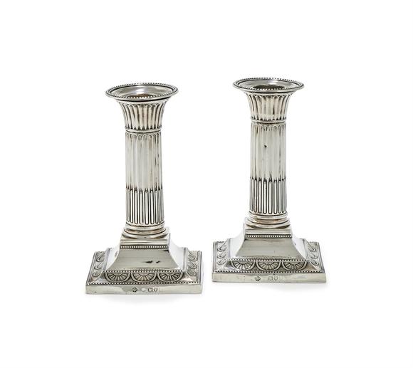 DreweattsA PAIR OF VICTORIAN SILVER CANDLESTICKS, WILLIAM HUTTON & SONS LTD., LONDON 1895