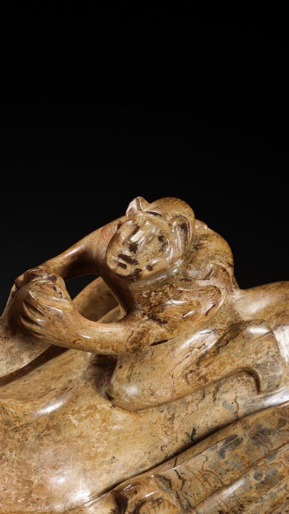 JUBAO HALL AUCTION HOUSE INCPre-Ming Dynasty Feathered Man Taming a Beast