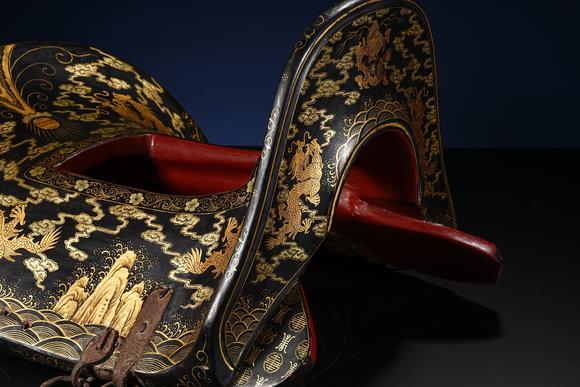 JUBAO HALL AUCTION HOUSE INCQing Dynasty Lacquered Saddle with Sea Wave and Dragon Motifs