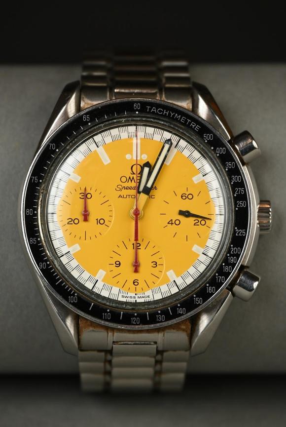Loeckx AuctioneersOmega Speedmaster \'Schumacher\' with yellow dial, a…