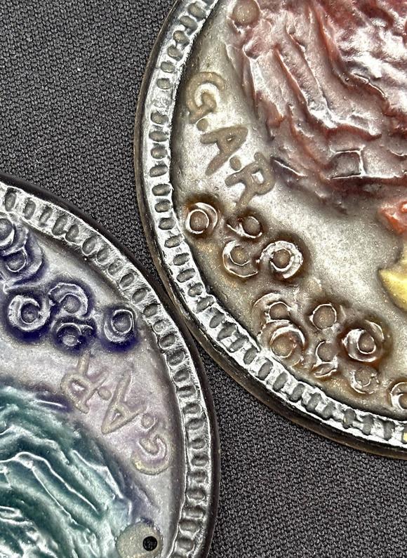 Loeckx AuctioneersArgy Rousseau Collection: two ‘parrot’ pendants in…