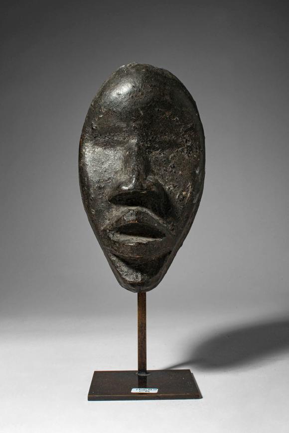 Apollo Art AuctionsCa. late 19th - early 20th century AD. >
A passport mask carved in wood of elongated oval form, t