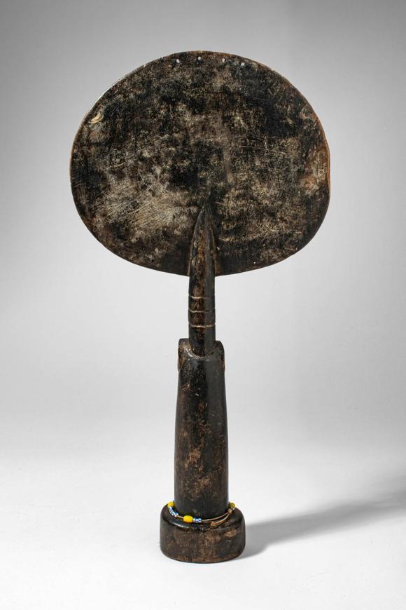 Apollo Art AuctionsCa. late 19th - early 20th century AD. >
An Ashanti doll carved in wood with a large disc-shaped