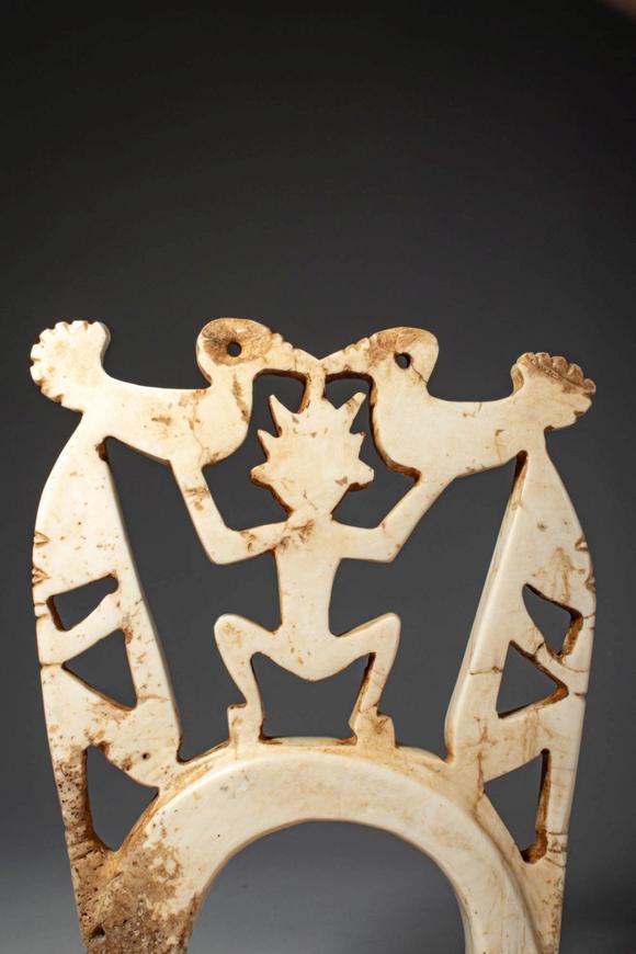 Apollo Art AuctionsCa. early 20th century AD. >
A pale stone openwork barava pendant features a complex figural comp