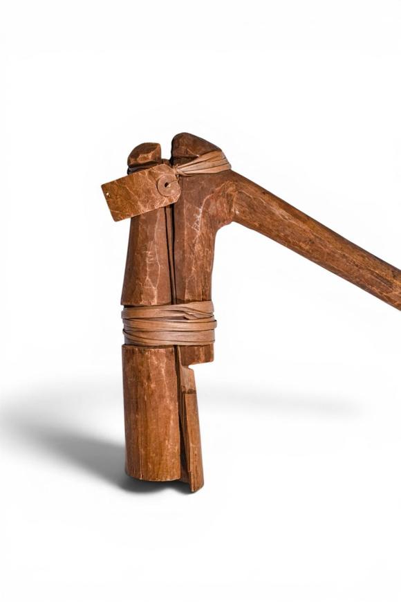 Apollo Art AuctionsCa. 20th century AD. >
A wooden adze pounder of characteristic L-shaped form, the long, slightly