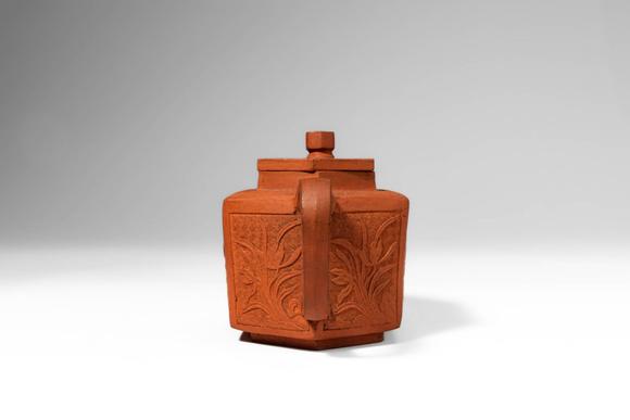 Apollo Art AuctionsKangxi Period, Qing Dynasty, Ca. AD 1661 - 1722. >
A Yixing stoneware teapot of hexagonal section