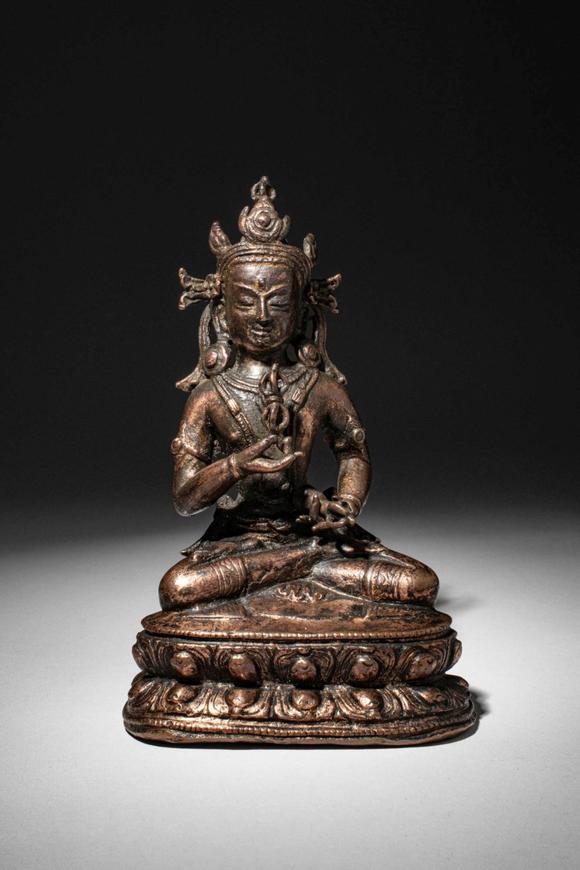 Apollo Art AuctionsCa. 14th century AD. >
A beautiful cast gilt copper alloy figure of Vajrasattva, seated in vajrap