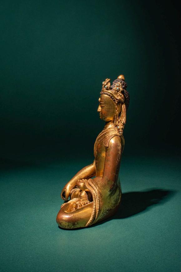 Apollo Art AuctionsCa. 15th century AD. >
A finely cast and richly gilded copper alloy figure of the Crowned Buddha