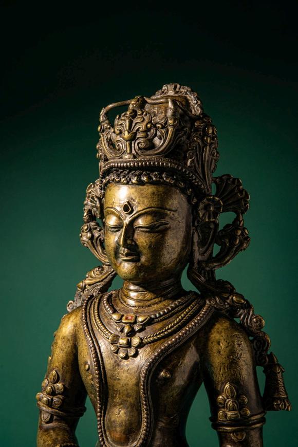 Apollo Art AuctionsCa. 14th century AD. >
A finely cast copper alloy figure depicting Kunzang Akor, seated in serene