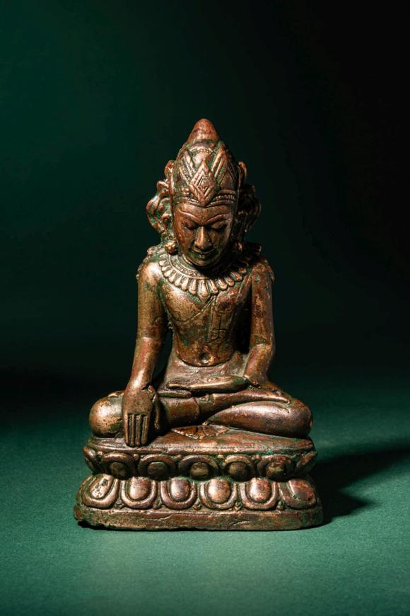 Apollo Art AuctionsCa. 12th - 13th century AD. >
A finely cast bronze figure of Buddha Shakyamuni, seated in bhumisp